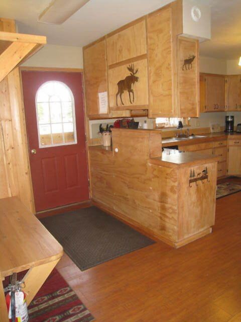 kitchen entrance , coat & boot rack
