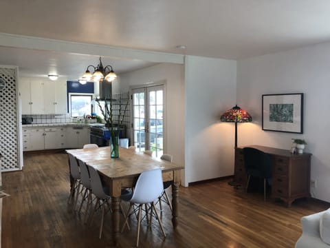 Dining Room with Office Desk and open concept to kitchen and living room