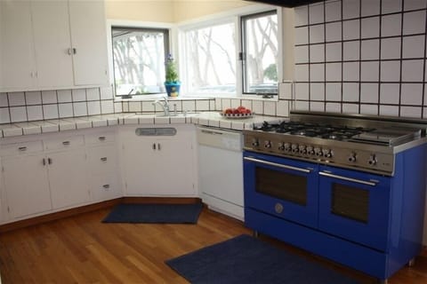 Ocean view kitchen w/ new Bertazzoni 6 burner, griddle, double oven range