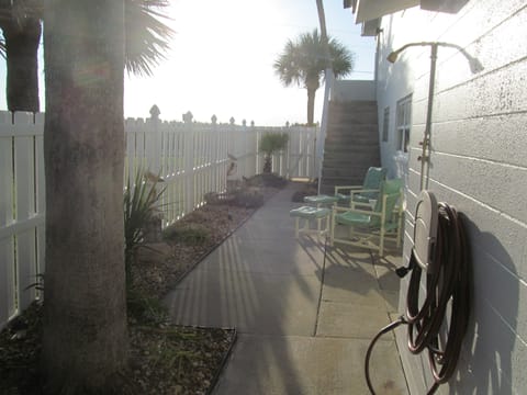 Outdoor shower and stairway to Unit 4