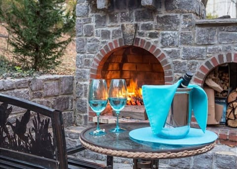 Enjoy a beverage while viewing our warm, cozy fireplace