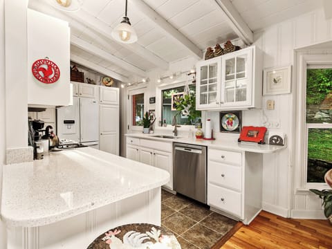 Quiet Bosch dishwasher & double stainless steel sinks.