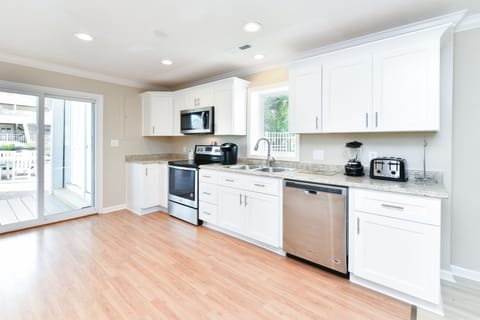 1st floor kitchen, stainless steel appliances, new cabinets, dishwasher