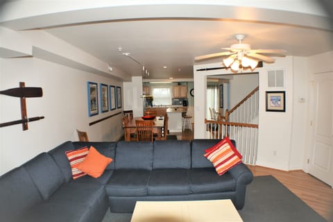 Living room with view toward kitchen