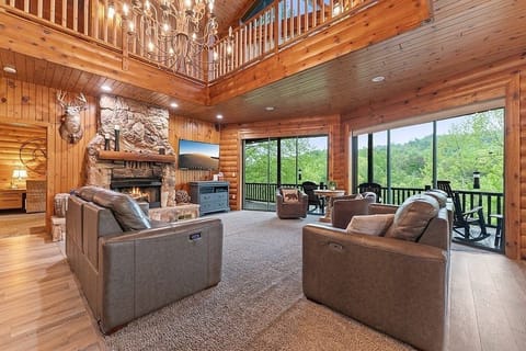 Gather in the cozy living room with gas fireplace (avail Oct-Apr) and smart tv