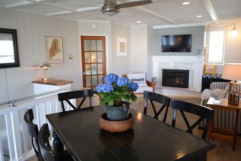 Great open dining and living room area with seats for every guest.
