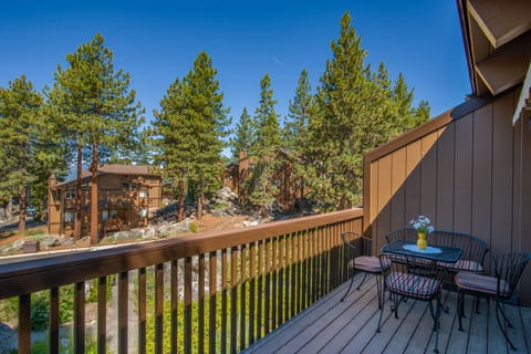 Our Deck facing the lake with bbq pananramic wide views, table, chairs bench