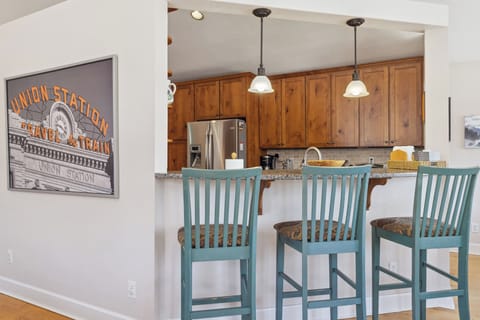 Bar chairs looking into kitchen