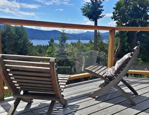 The sunny main patio offers a broad ocean view.