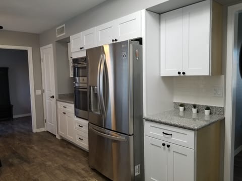 French door refrigerator and new oven & microwave. full pantry