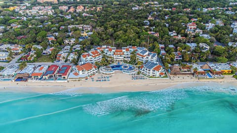 Fisherman's boutique resort-condo complex- just 55 units & large sandy beach