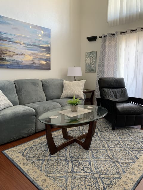 Comfortable living area with beautiful lighting! 