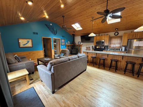 Spacious living room with 2 sofa sleepers and a recliner chair