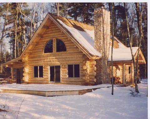 Enjoy Winter in the majestic great room with its 25 foot ceiling.