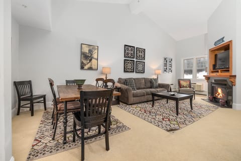 Landmark Condo! Living Room with Fireplace and Slope Views