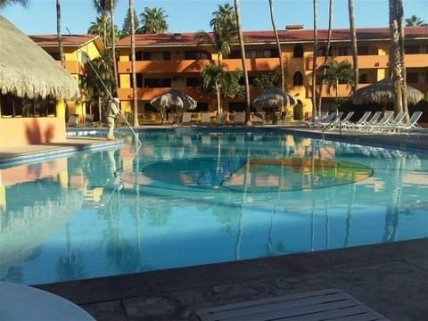Quiet & peaceful Oasis pool with bar/restaurant service and happy hour.