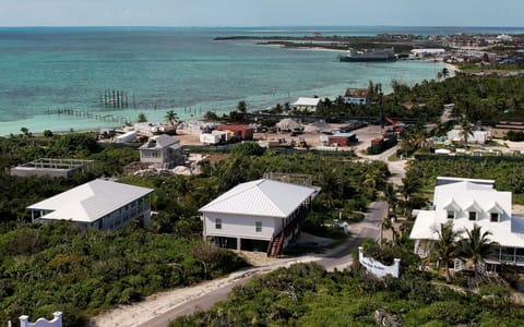 Pirate's Place w/ the brown stairs. View from the Settlement toward Baker's Bay