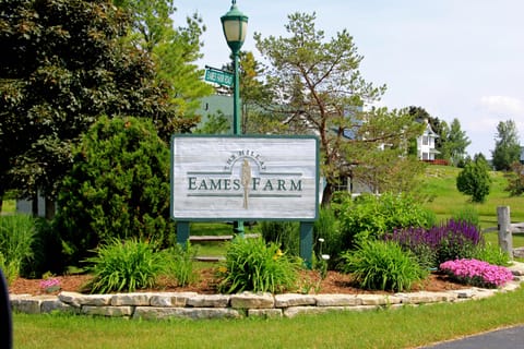 Entrance to The Hill at Eames Farm. First of the condos at the upper right.