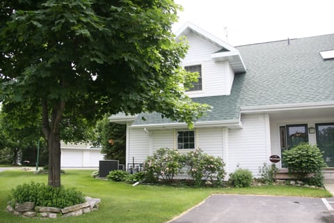 Parking area has space for 2 vehicles at the front door.