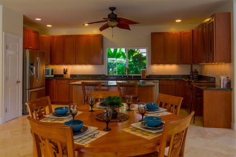 Gourmet kitchen and open dining room