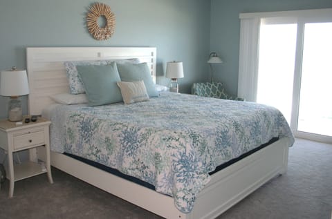 Master bedroom, balcony access, king bed