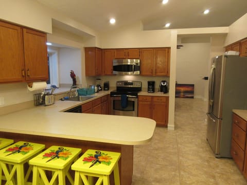 KITCHEN WITH MODERN APPLIANCES, KEURIG, MR. COFFEE, BLENDER, TOASTER, MICROWAVE