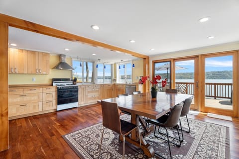 The eat-in kitchen has sliding glass doors to the deck for easy exterior dining.