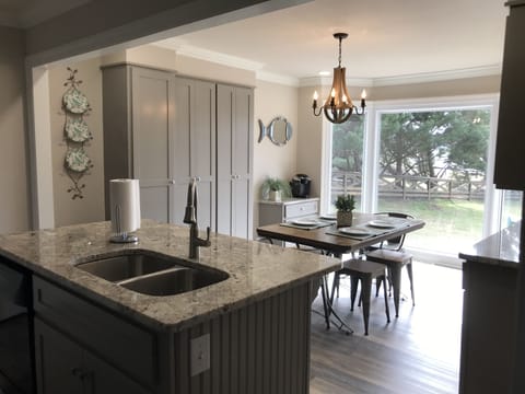 Lake view from the kitchen/breakfast nook. Seating for six, plus two barstools.