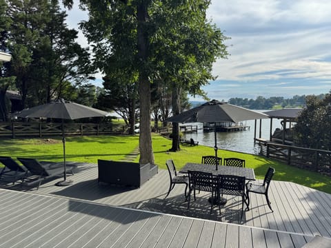 Umbrella-shaded outdoor dining. Grill available for guests.