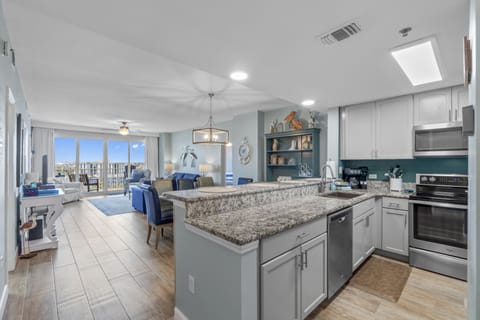Fully updated kitchen with open living concept and unobstructed beach views
