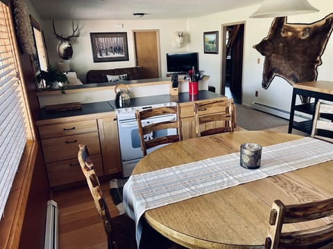 Kitchen -  adding 2 table leaves seats up to 8-10, with seating for 3 at counter