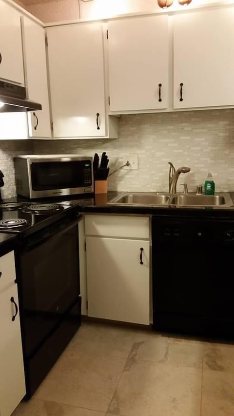 Full size kitchen is well stocked.