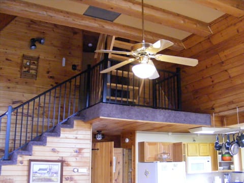 KITCHEN AND MAIN LIVING ROOM AND STAIRCASE