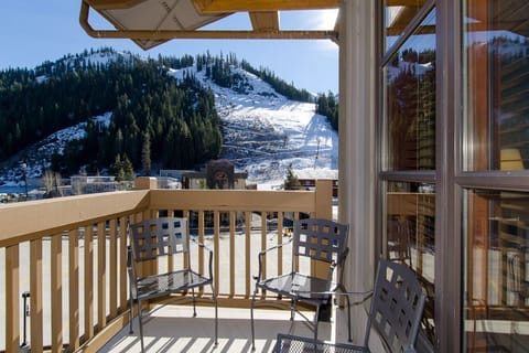 Perched on the top floor, this petite patio offers a unique vantage point for scenic views