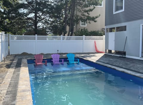 Pool with tanning ledge.new furniture for 2024.