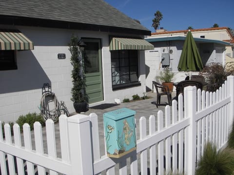 Front of the main house with large patio and sitting area