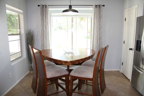 Kitchen table in front of window looking to street