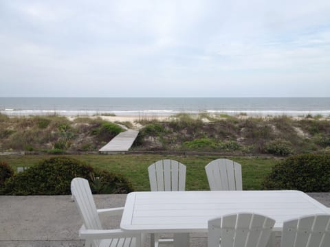 Outdoor mealtime view! Only steps from the sand & yard for outdoor lawn games!