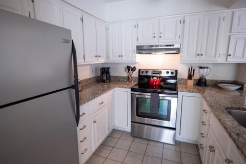 Fresh updated kitchen fully equipped for cooking and dining. 