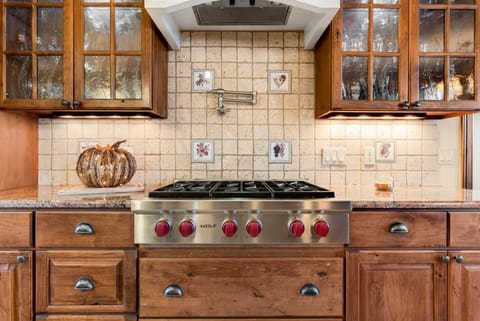 6 Burner Wolf Range in Gourmet Kitchen
