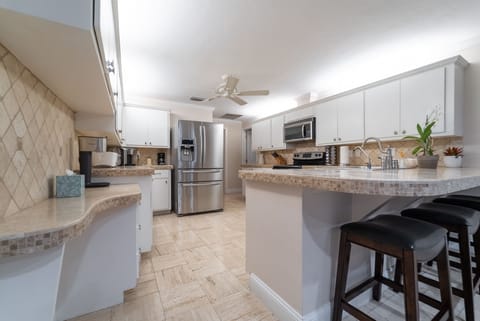 kitchen looking towards game room and pantry