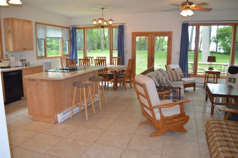 Main floor great room of the Lake House (kitchen to left, TV/sitting area right)