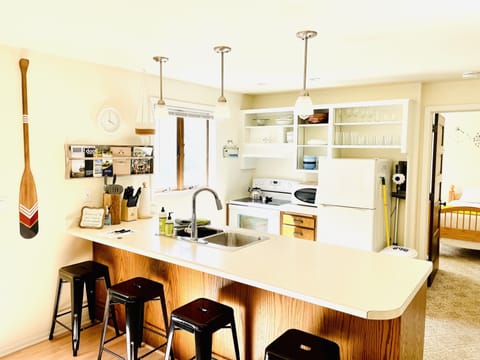 Open concept kitchen with bar seating