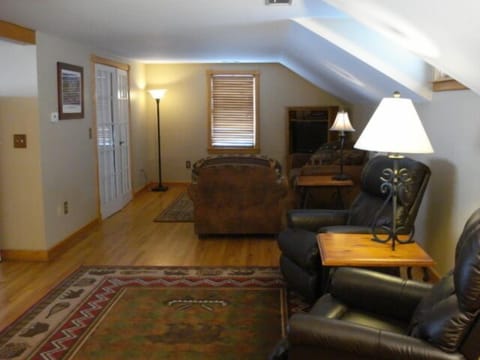 View of living room area from hallway looking East.
