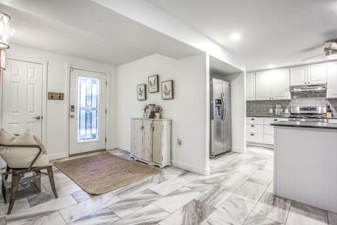 Front Entry - Walk in through the front door into the open floor plan kitchen and dinning area. You will feel at home as soon as you step in and close the door.