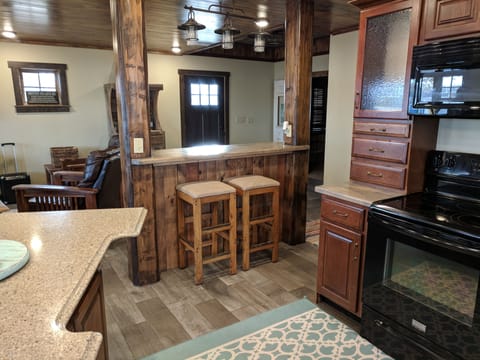 Main level view from kitchen to front door