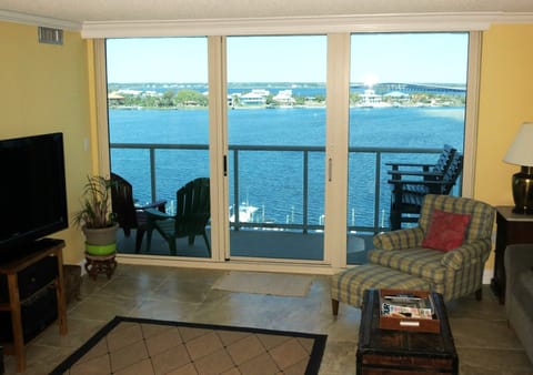 view of Little Sabine Bay and beach bridge from living room
