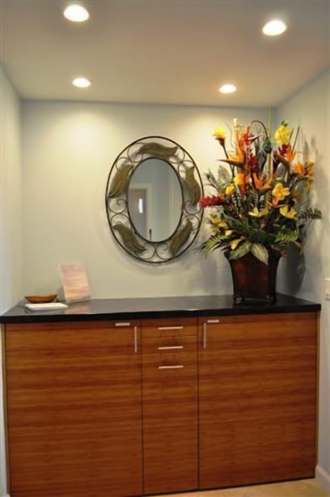 Entry Foyer with custom bamboo cabinetry and full size washer and dryer
