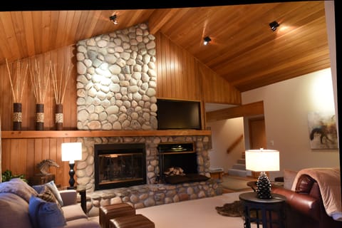 Living room with real wood burning fireplace