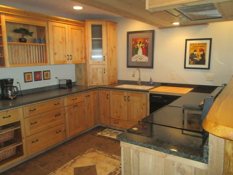 Kitchen with Knotty Alder Cabinets